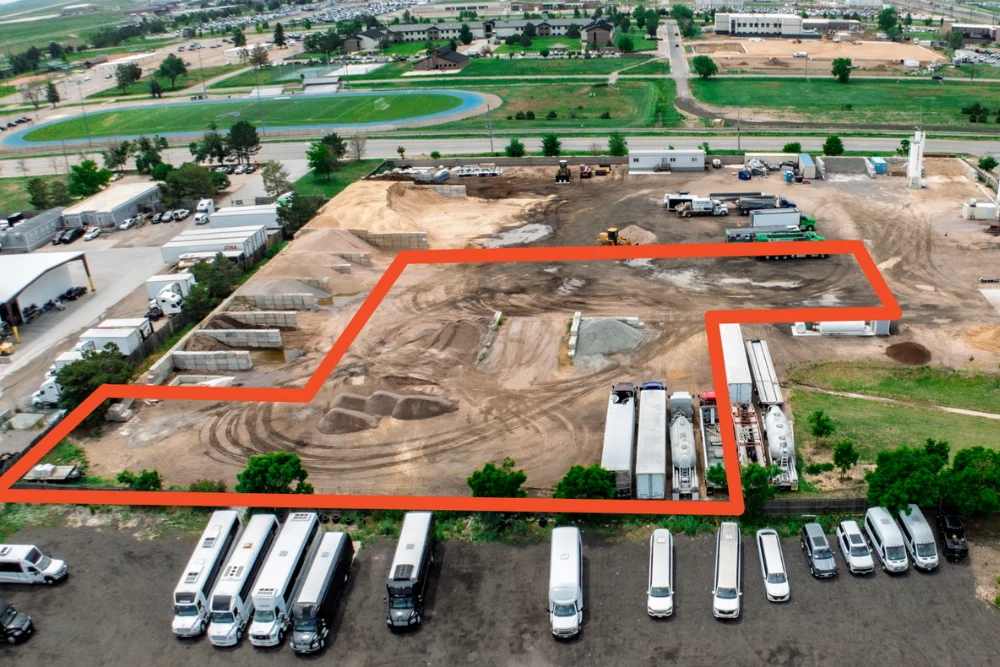 Industrial Yard for Lease Aurora CO — Aerial view of leased fenced yard near highways in Aurora, Colorado