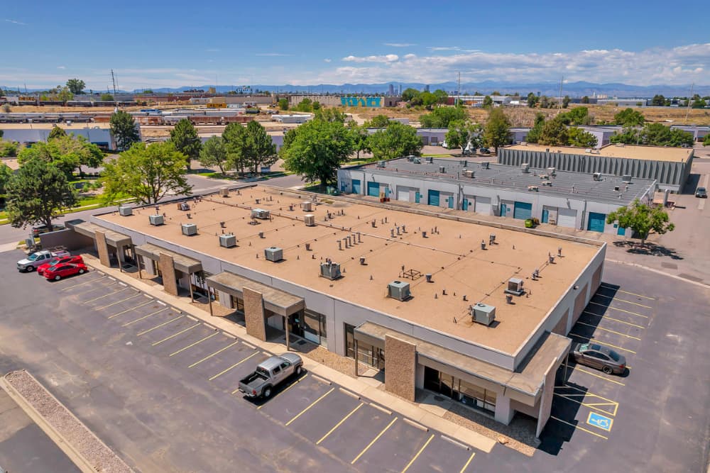 Denver warehouse for lease with retail storefront and drive-in loading access secured by The Warehouse Hotline