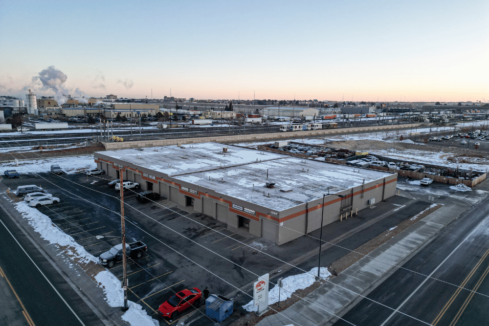 Aurora warehouse leased at 3596 Moline Street with drive-in door and office amenities