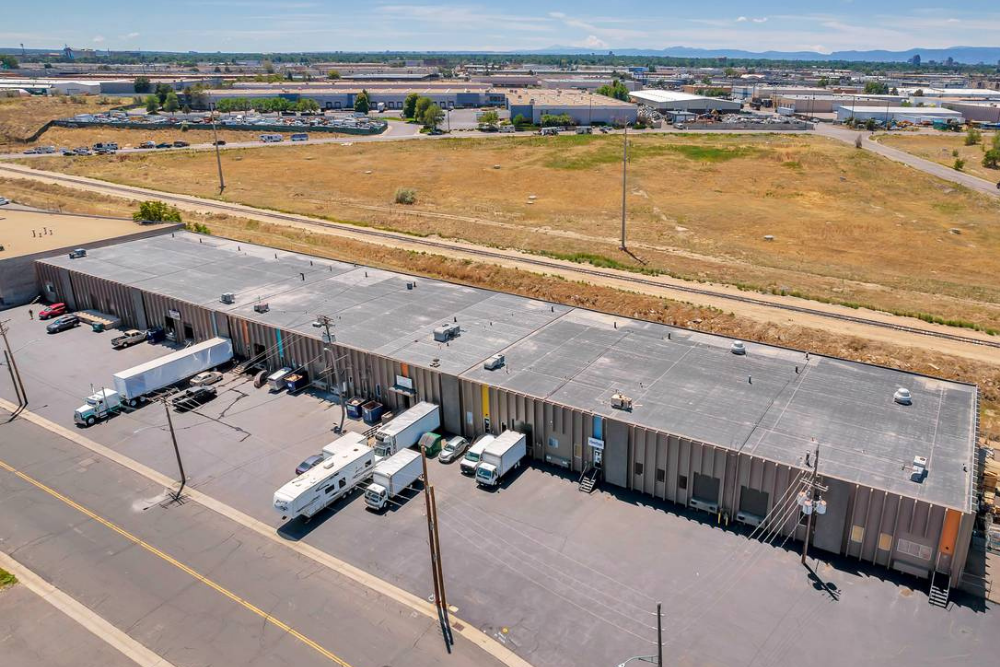 Commerce City industrial lease extension secured by The Warehouse Hotline