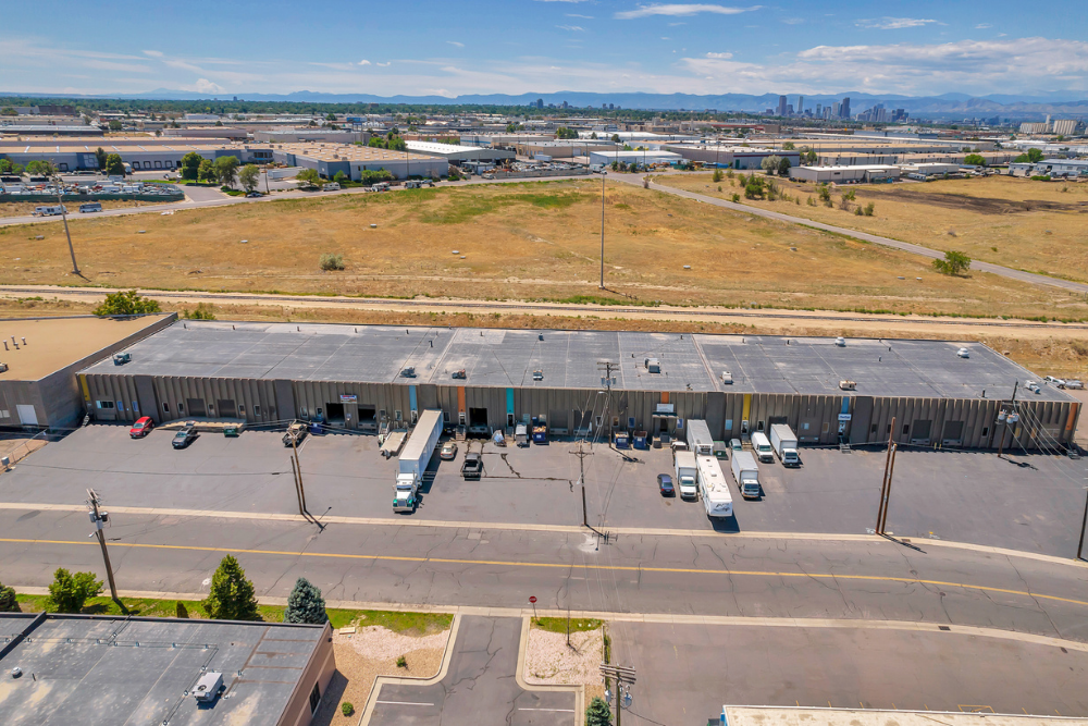 Commerce City industrial lease at 6056 E 49th Avenue with 6,586 SF warehouse and 5,000 SF yard